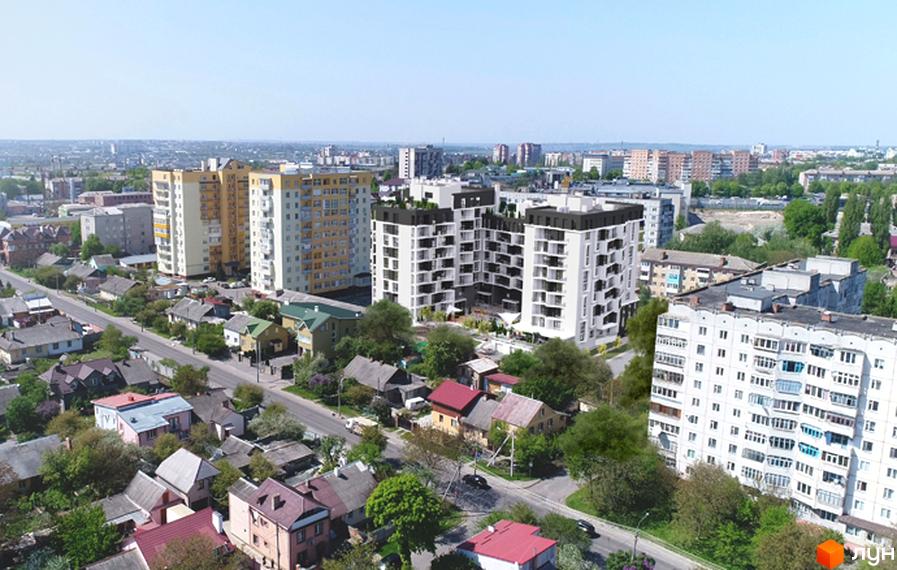 Житловий комплекс 360 - це сучасна новобудова з білими фасадами та чорними елементами. Навколо комплексу розташовані дерева та зелені насадження.