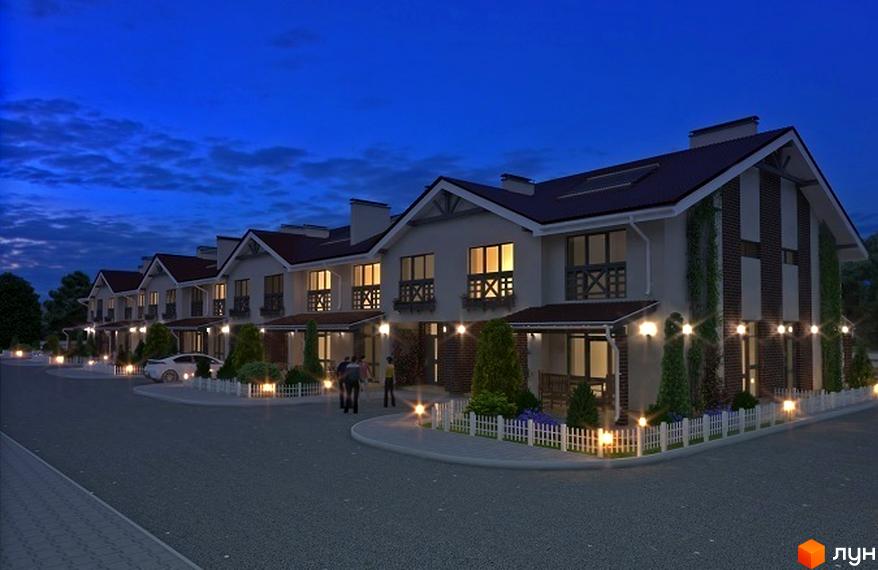 Таунхауси EcoVillage у вечірній час. Зовнішній вигляд будинків з цегляними елементами та підсвіткою. Прибудинкова територія з парканом та освітленням.