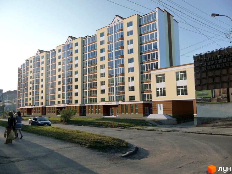 Зовнішній вигляд новобудови на вул. Василя Порика: багатоповерховий будинок світло-жовтого кольору з великою кількістю вікон. Поруч розташована прибудинкова територія з дорогою та пішохідною зоною.