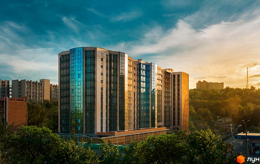 Житловий комплекс River Park з високими секціями, світлим фасадом та великими синіми вікнами, оточений зеленими деревами та міським пейзажем на заході сонця.