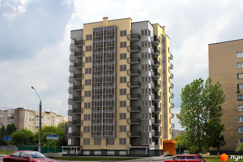 Висотна новобудова з великими вікнами та балконами. Поруч з будинком зелені насадження та дорога з автомобілями.