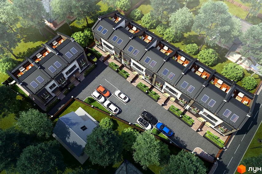 Таунхауси „Затишний“: вид зверху на сучасні будинки з сірими дахами та парковкою. Навколо зелені дерева та доглянута територія.