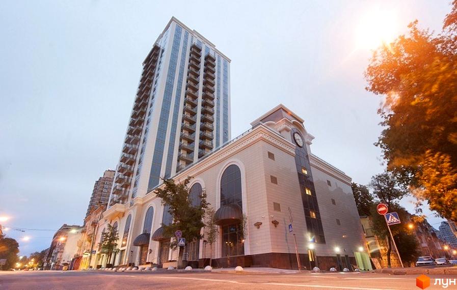 Житловий комплекс Арт Холл з сучасною архітектурою та прибудинковою територією, обладнаною для відпочинку.