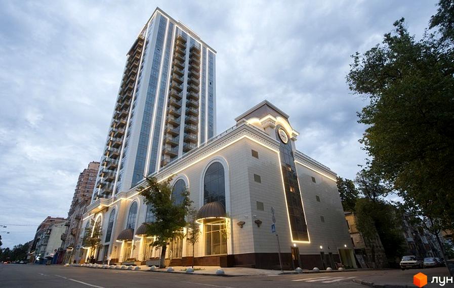 Житловий комплекс Арт Холл з сучасним фасадом та прибудинковою територією, оточений зеленими насадженнями.