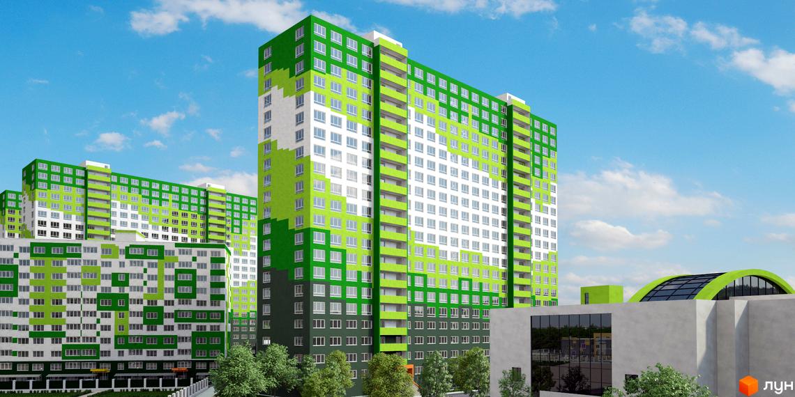 Багатоповерхові будинки ЖМ Острови з фасадами зелених та білих кольорів. Навколо видно зелені насадження та споруду з арковим дахом.