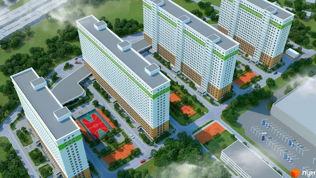 Житловий комплекс Лузанівський Парк з висоти пташиного польоту. Багатоповерхові будинки з білими фасадами та зеленими елементами. На території облаштовані спортивні майданчики та парковка.