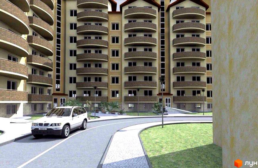 Житловий комплекс на вул. Чорновола 22, 22а з бежевими фасадами та коричневими вигнутими балконами. На території є дорога, пішохідна доріжка та зелені насадження.