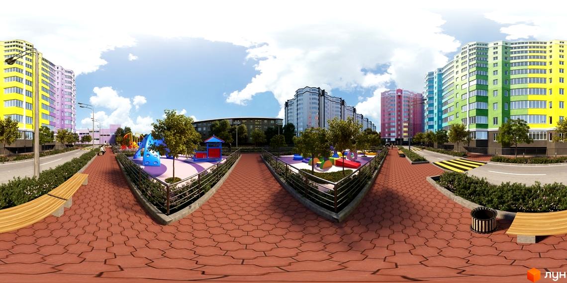 Житловий комплекс Святопетрівський: багатоповерхові будинки з різнокольоровими фасадами та облаштована прибудинкова територія з дитячими майданчиками.