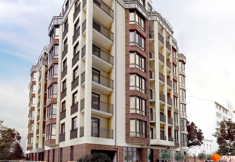 Зовнішній вигляд будинку на вулиці Лемківська, 26. Багатоповерхова будівля з балконами та цегляним оздобленням, прибудинкова територія з деревами.