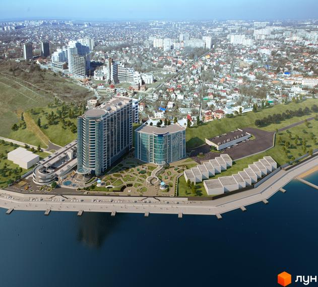 Житловий комплекс Морська симфонія з сучасними будівлями та прибудинковою територією з зеленими насадженнями і зоною відпочинку.