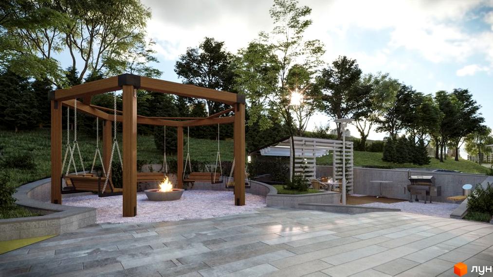 Клубний будинок Corner. Затишна зона відпочинку з гойдалками та вогнищем біля житлового комплексу.