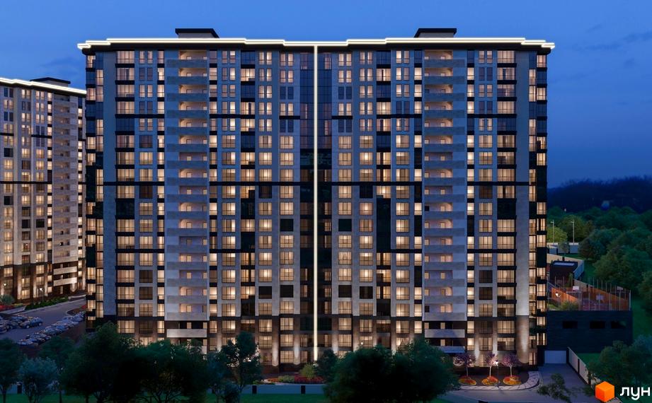 Житловий комплекс Crystal Towers з підсвіченими вікнами та балконами ввечері. Поруч розташований паркінг та зелена зона з деревами.