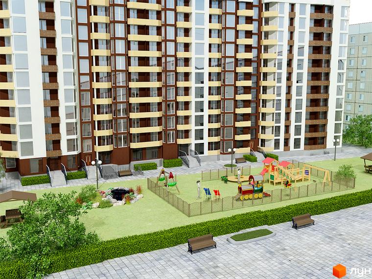 Багатоповерховий житловий комплекс з біло-коричневим фасадом. Прибудинкова територія облаштована дитячим майданчиком, зеленими зонами та лавками.