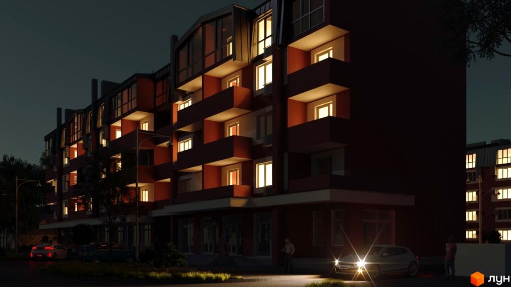 Нічний вигляд житлового комплексу Гостомельські липки з підсвіченими вікнами та балконами. На передньому плані дорога з автомобілями та вуличним освітленням.