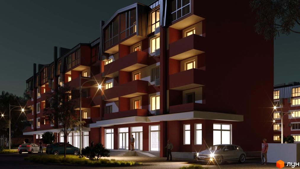 Нічна фотографія житлового комплексу Гостомельські липки з червоними фасадами та балконами. Навколо будинку видно вуличні ліхтарі та припарковані автомобілі.