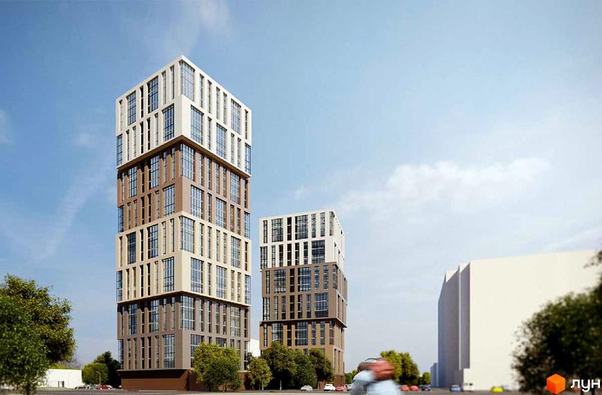 Два високі будинки Житлового комплексу Грані з фасадами світлих та темних відтінків, великими вікнами. Навколо будівель зелені дерева та дорога з автомобілями.