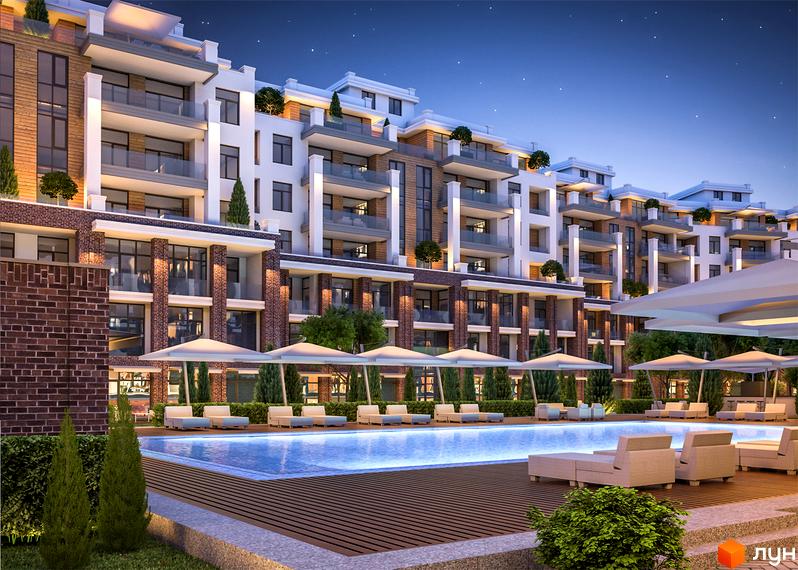 Житловий комплекс Comfort City з басейном та шезлонгами. Сучасна архітектура будівлі з балконами та цегляними елементами.