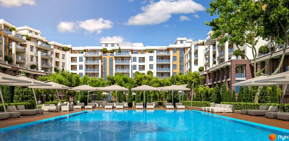 Житловий комплекс Comfort City з басейном та зоною відпочинку. Сучасна архітектура будівель та доглянута прибудинкова територія з зеленню.