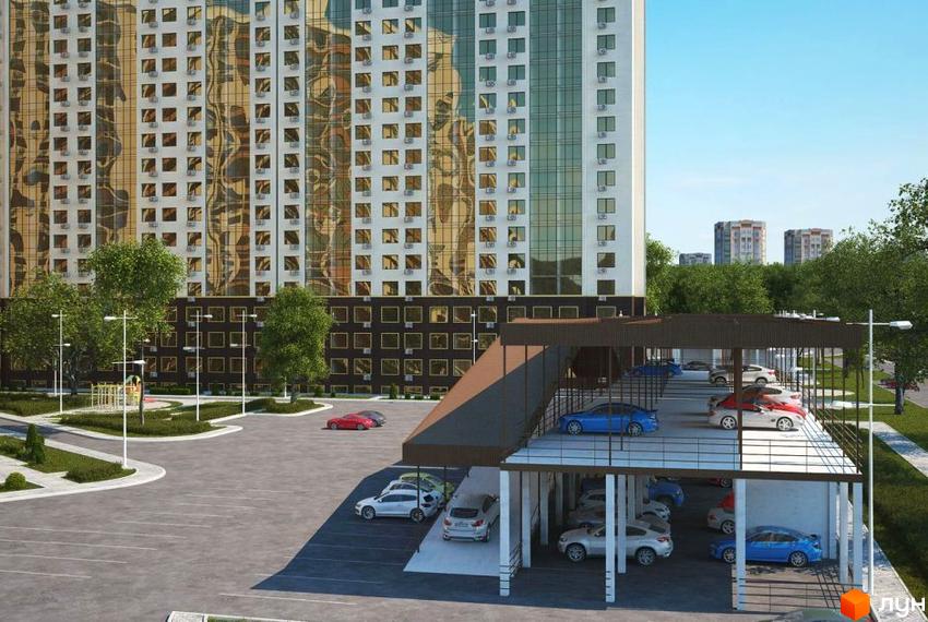 Житловий комплекс Тридцять сьома перлина з паркінгом та прибудинковою територією. Висотна будівля з великою кількістю вікон, поруч розташовані дерева та дитячий майданчик.