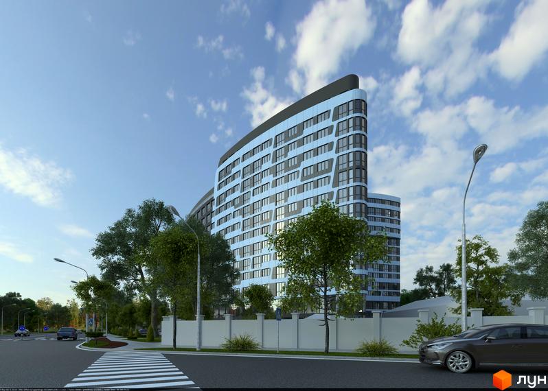 Житловий комплекс Парус з вигнутим фасадом блакитного кольору та сірими елементами. Навколо будинку зелені дерева та вулиця з пішохідним переходом.