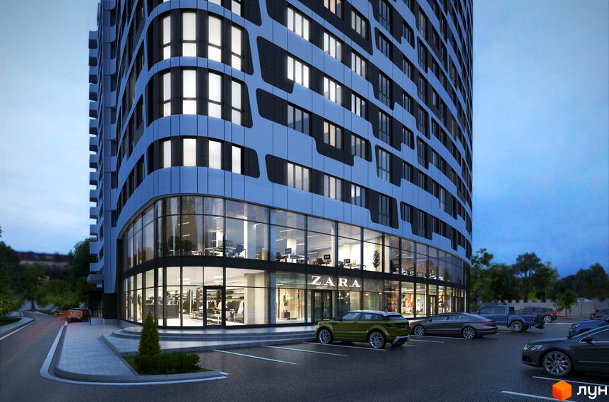 Новобудова ЖК Парус з панорамними вікнами та фасадом з білих та сірих панелей. Парковка з автомобілями біля входу в будівлю.