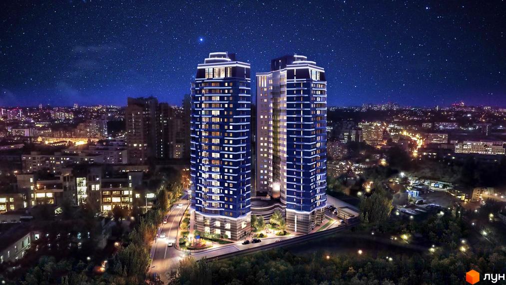 Нічний вид на житловий комплекс Alter Ego з підсвіченими фасадами та зони відпочинку з дитячим майданчиком.