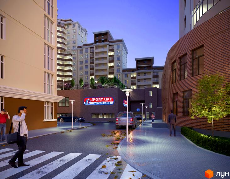 Зовнішній вигляд житлового комплексу Авіа Квартал з прибудинковою територією та пішохідними доріжками.