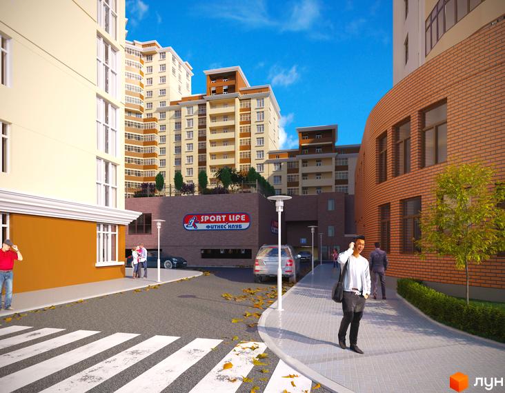 Зовнішній вигляд житлового комплексу Авіа Квартал з прибудинковою територією, пішохідними доріжками та паркувальними місцями.