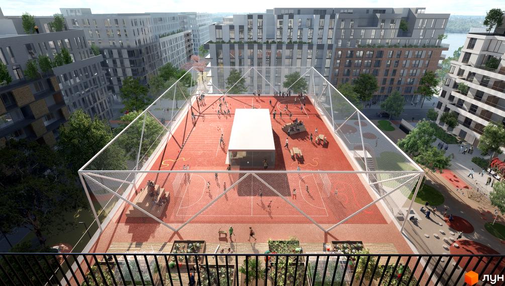 Житловий район Rybalsky: багатоповерхові будинки з численними вікнами та великий червоний спортивний майданчик з огорожею на даху.