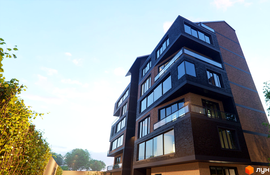 Зовнішній вигляд новобудови Perfect Loft 47 з цегляним фасадом та великими вікнами. Навколо зелені дерева та кущі.