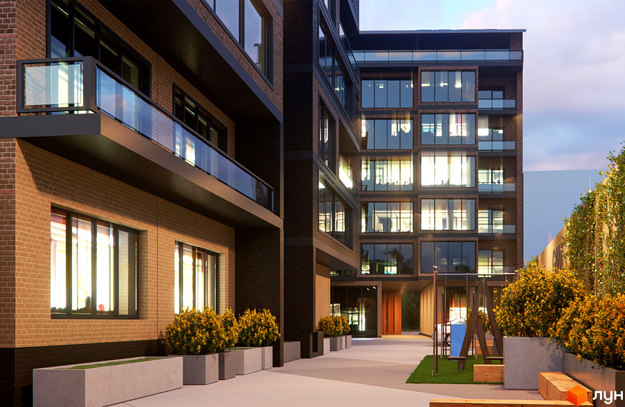 Новобудова Perfect Loft 47 з цегляним фасадом та великими вікнами. Поруч розташований внутрішній двір з кущами та дитячим майданчиком.