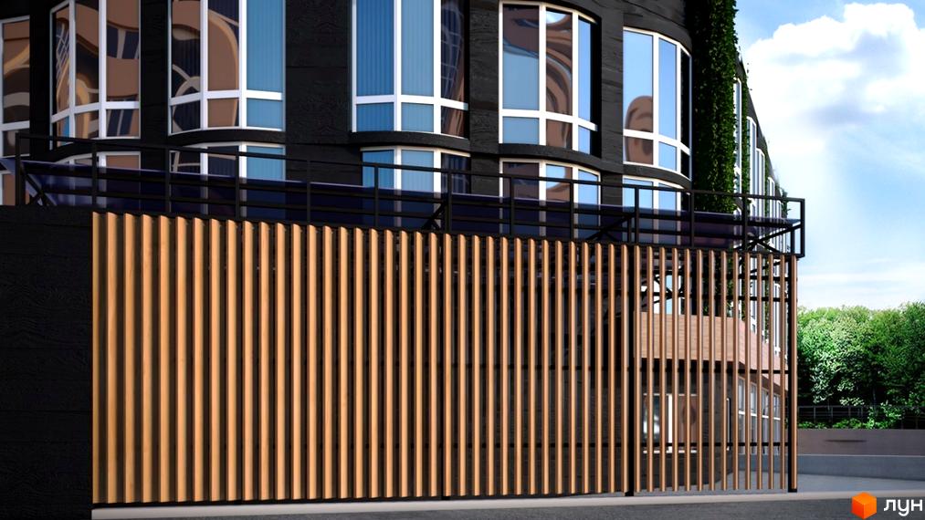 Новобудова The Apartments з темним фасадом та великими вікнами, огороджена дерев'яним парканом. Прибудинкова територія з зеленню.