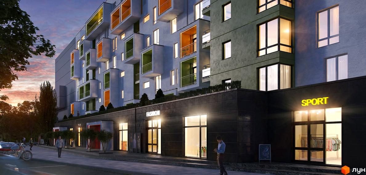 Зовнішній вигляд житлового комплексу Квартал Віденський з балконами різних кольорів та магазинами на першому поверсі. Навколо будинку розташовані дерева та тротуар з пішоходами.