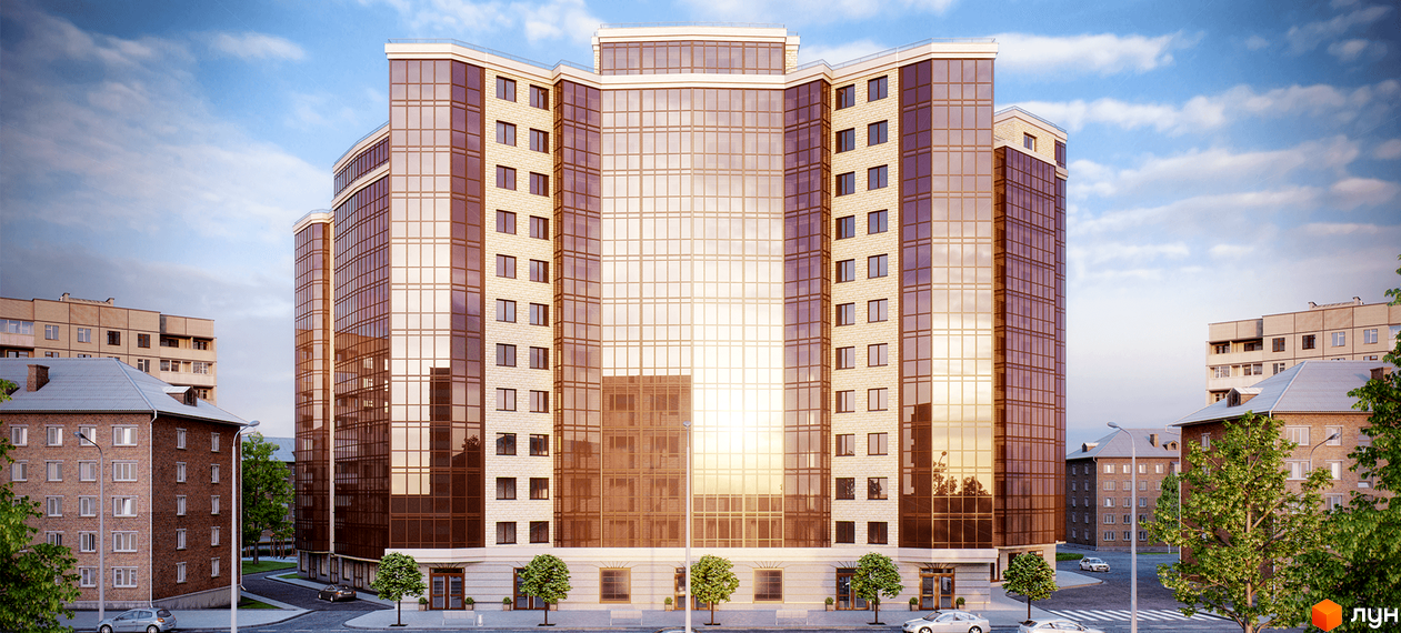 Житловий комплекс Pirogovsky - сучасна архітектура з великою кількістю скла. Навколо комплексу зелені насадження та дороги.