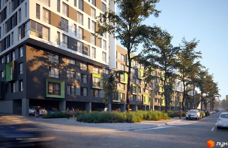 Зовнішній вигляд новобудови Місто Трав з сірими та білими фасадами, зеленими віконними рамами та прибудинковою територією з деревами та автомобілями.