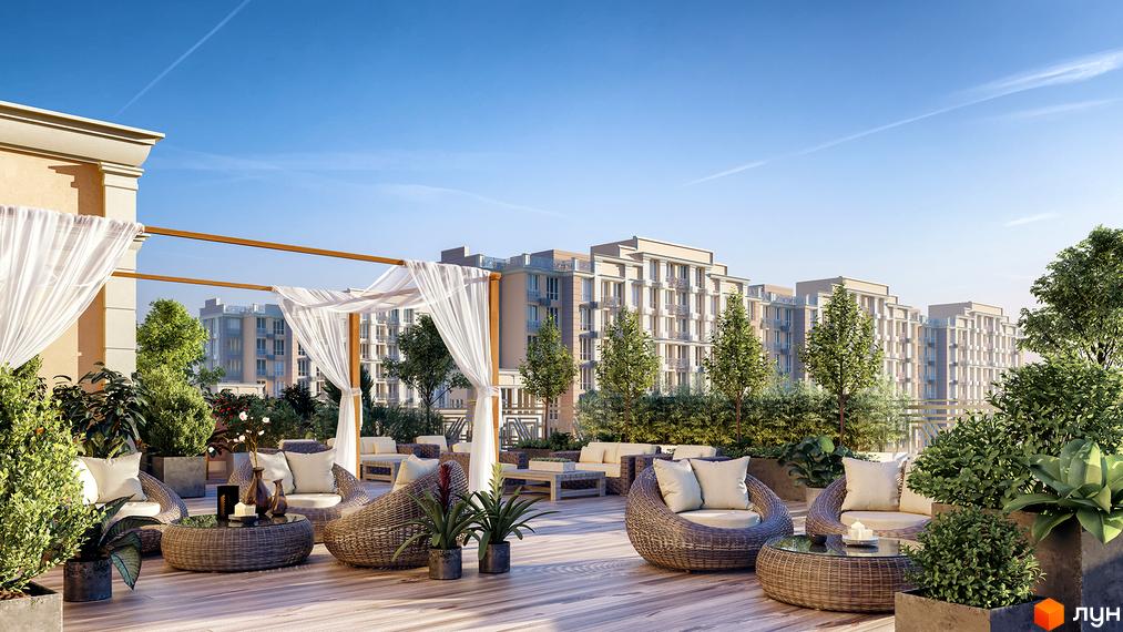 Житловий комплекс Благород: затишна тераса з плетеними меблями та зеленню на фоні багатоповерхових будинків. Відкритий простір для відпочинку.