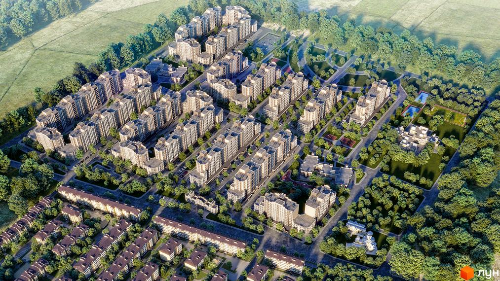 Вид на житловий комплекс Благород з висоти пташиного польоту. Багатоповерхові будинки оточені зеленню та мають доглянуту прибудинкову територію з зонами відпочинку.