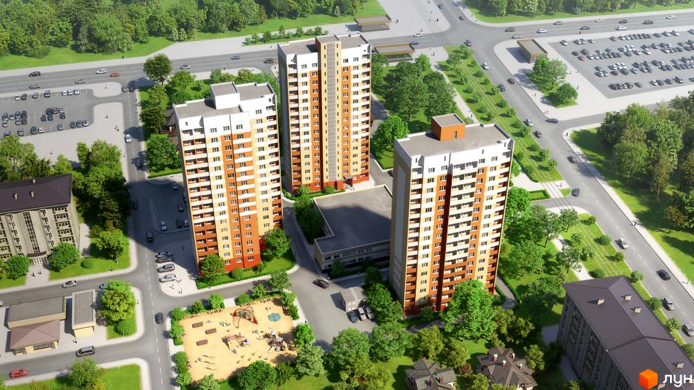 Висотні будинки житлового комплексу Металіст з оранжево-білими фасадами. Навколо зелені насадження, дороги та дитячий майданчик.