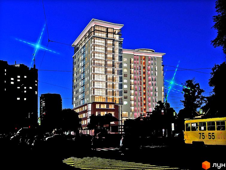 Житловий комплекс Кристал - сучасна новобудова з багатоповерховими будинками та елегантною архітектурою. Навколо комплексу розташована міська інфраструктура з транспортом та деревами.