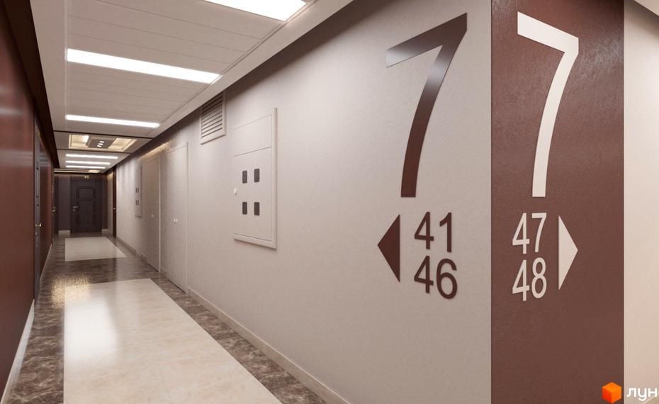 Дизайн коридору в житловому комплексі Шевченківський. На стіні видно вказівники поверхів та номерів квартир. Оздоблення стін та підлоги виконано в спокійних тонах.