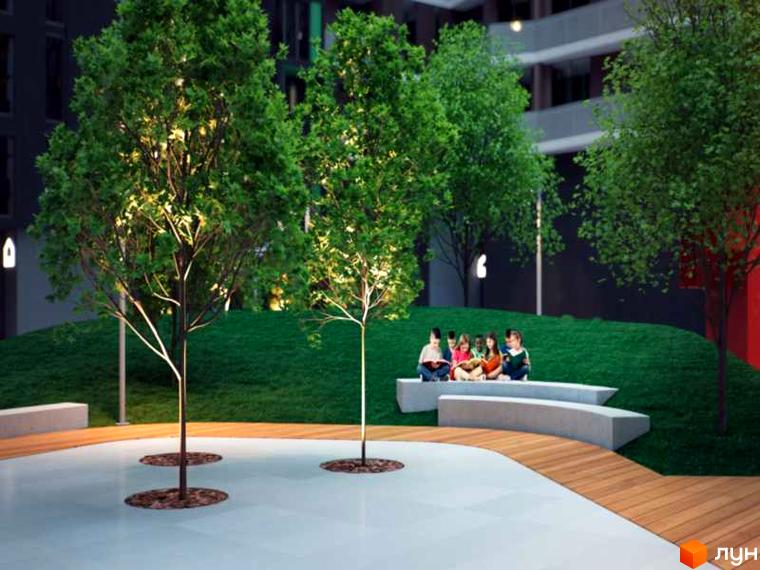 Житловий комплекс Avalon: діти читають на лавці біля освітлених дерев. Затишна прибудинкова територія з газоном та дерев'яною зоною відпочинку.