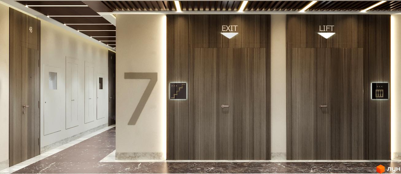 Коридор в житловому комплексі з дверима, на яких є позначки виходу та ліфту. На стіні велика цифра 7.