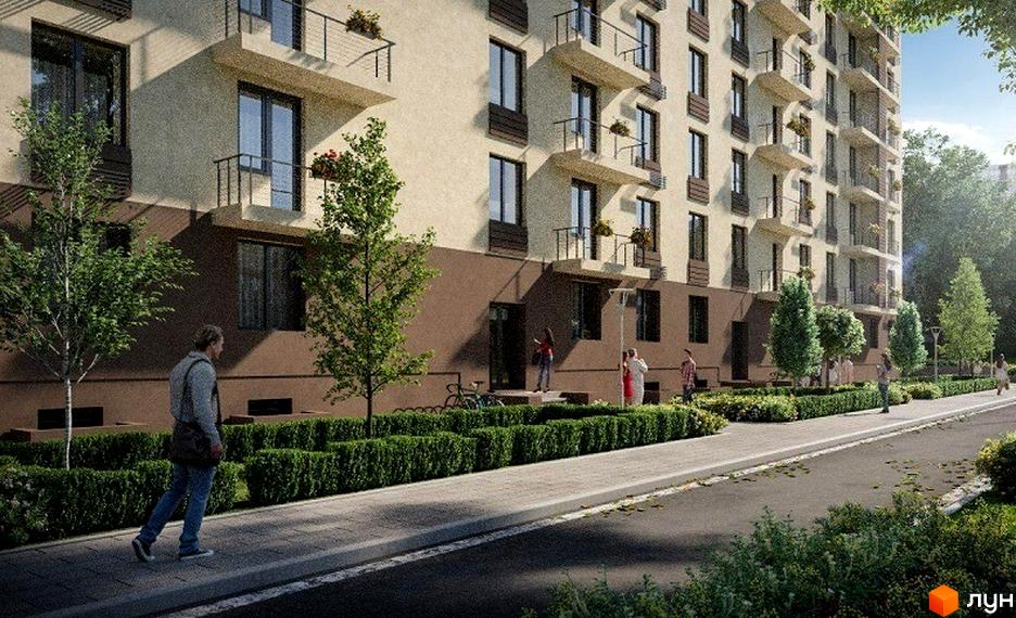 Зовнішній вигляд будинку ЖК Коломийський з балконами та вікнами. Прибудинкова територія з деревами та кущами.