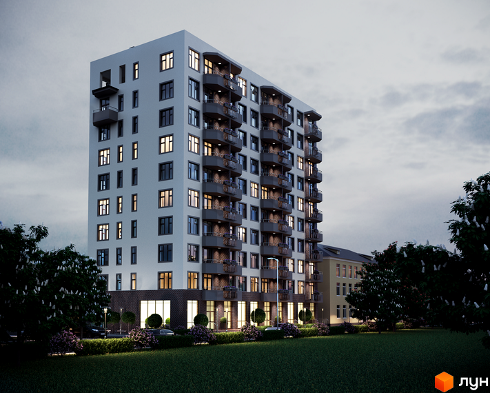 Апарт-комплекс Електриків – це висотна новобудова з балконами та великими вікнами. Навколо будинку доглянута прибудинкова територія з газоном та деревами.