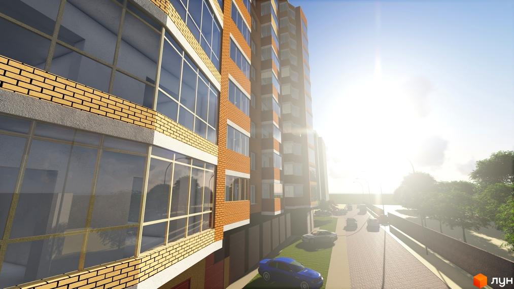 Житловий комплекс Слов'янський: цегляний фасад будівлі з великими вікнами та заскленими балконами. Поруч дорога з автомобілями та зелені насадження.