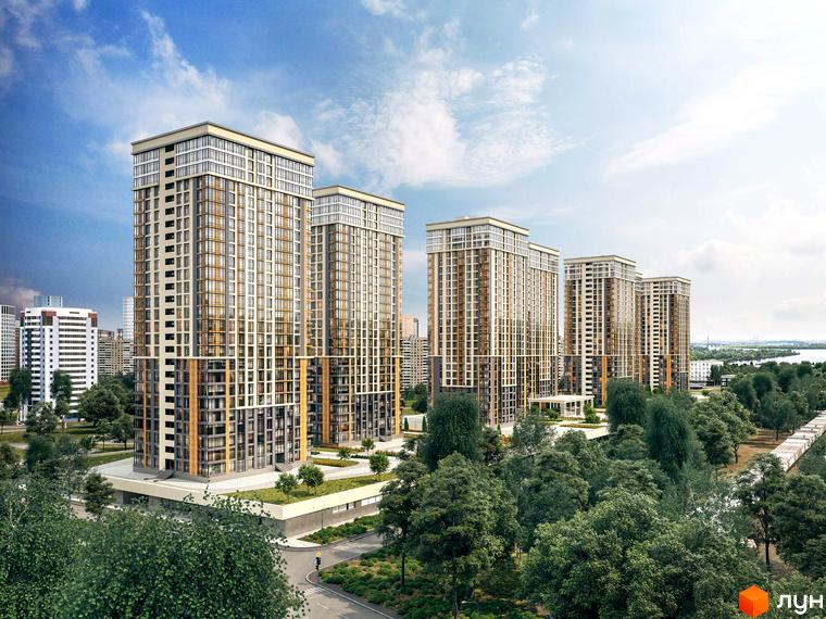 Житловий комплекс Урлівський-1: висотні будинки з панорамним склінням та сіро-бежевим фасадом на тлі блакитного неба. Навколо зелені дерева та доглянута прибудинкова територія.