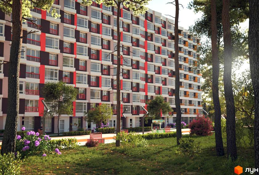 Новобудова ЖК Art Парк з яскравим фасадом та балконами. На прибудинковій території зелені насадження, лавки та квіти.