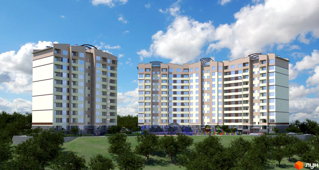 Зовнішній вигляд новобудови ЖК 4 Карата з світлими та бежевими фасадами, численними вікнами та балконами. На прибудинковій території облаштований дитячий майданчик та зелені насадження.
