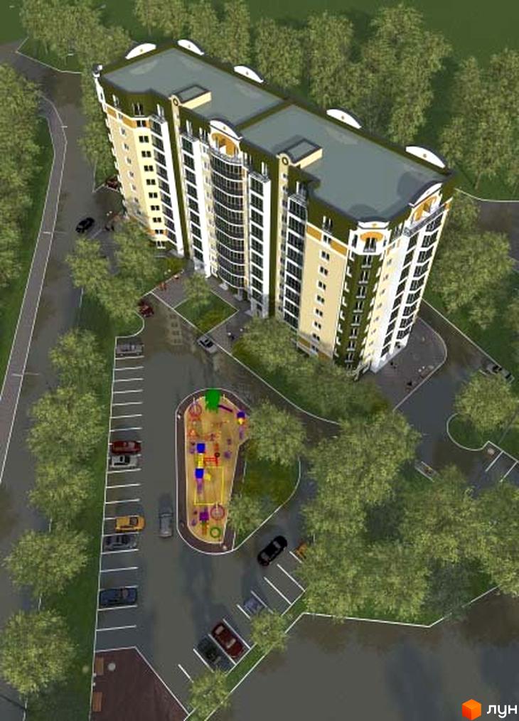 Вид зверху на багатоповерховий житловий комплекс з жовто-білим фасадом, зеленою покрівлею та балконами. На прибудинковій території розташовані дитячий майданчик та парковка з автомобілями.