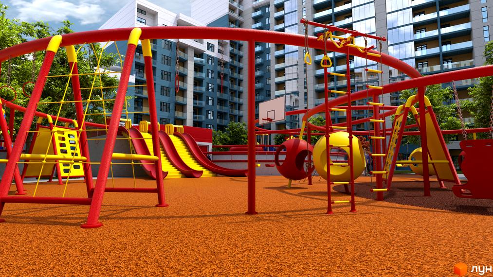 Ігровий майданчик у дворі ЖК Національний. Дитячий майданчик з гірками, драбинками та кільцями для ігор на свіжому повітрі.